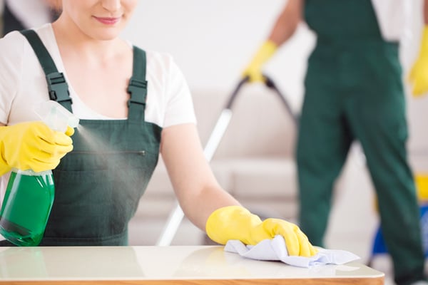A professional cleaning crew improves indoor air quality in a home.